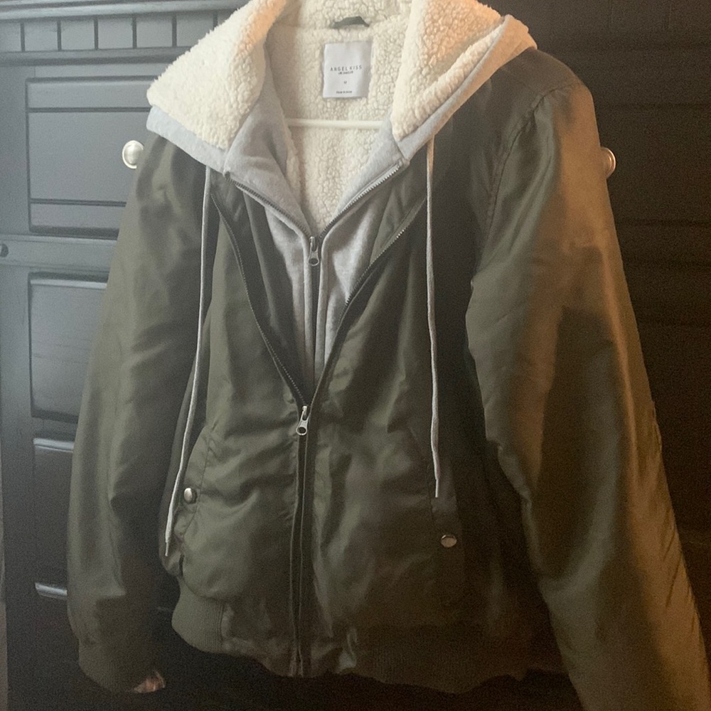 Bomber jacket, with attached hood and sweatshirt insert. Waist length